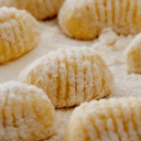 Foto de Ñoquis de sémola con salsa crema de hongos 