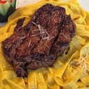 Foto de Lomo Saltado con Espagueti a La Huancaína 