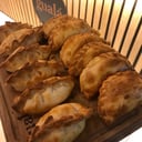 Foto de Empanadas cebolla y queso, choclo, verdura o canastitas de verdura 