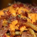 Foto de PAPAS CON CHEDDAR Y PANCETA