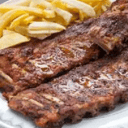 Foto de TIRA DE COSTILLA CON GUARNICIÓN.