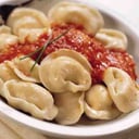 Foto de Capellettis de pollo, jamón y parmesano