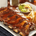 Foto de TIRA DE COSTILLA DE CERDO CON GUARNICION