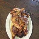 Foto de Porción de pollo al horno (no incluye guarnición)