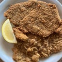 Foto de Milanesa de carne o pollo con guarnición