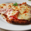 Foto de Milanesa a la napolitana de pollo