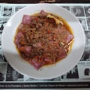 Foto de Ravioles de calabaza y muzzarella en masa de remolacha