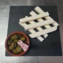 Foto de Tapa de queso ahumado / White cheese