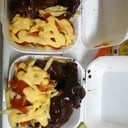 Foto de Alitas acompañadas con papas 