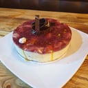 Foto de CHESSECAKE FRUTOS ROJOS O MARACUYA (porción)