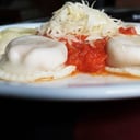 Foto de Sorrentinos de Jamón y queso con salsa 