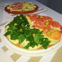 Foto de Pizza integral de muzza y rucula 