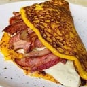 Foto de Cachapa de queso Llanero y lomo de Cerdo Ahumado