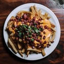 Foto de Papas con cheddar y bacon