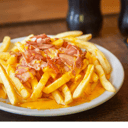 Foto de Promo - Papas con cheddar y Bacon + Gaseosa de 1,5 L/ Cerveza 1L.