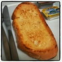 Foto de MEDIA TOMATE CON ACEITE O MANTEQUILLA