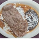 Foto de Chilaquiles rojos con bistec