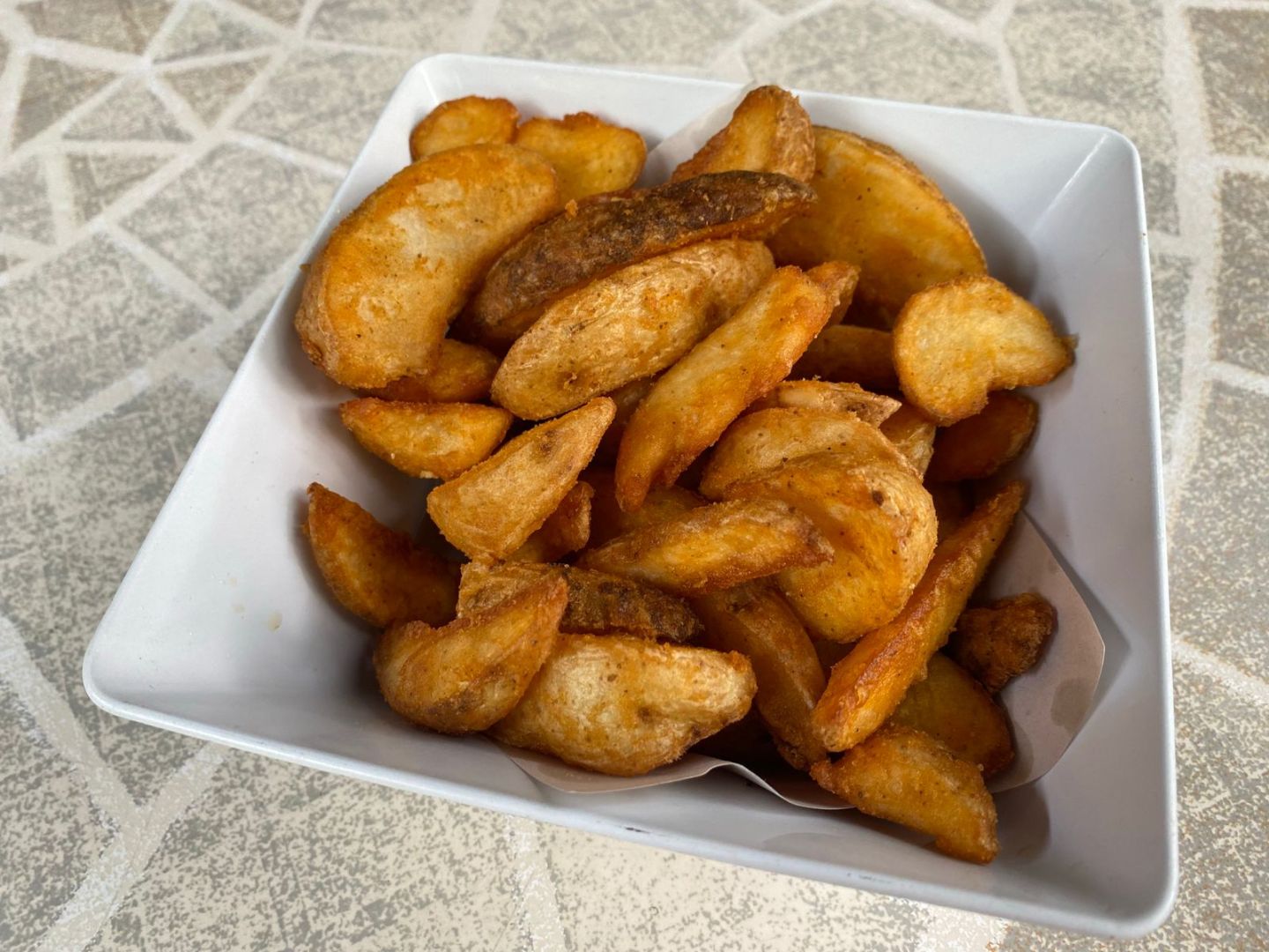 Foto de Papas de gajo sazonadas