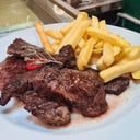 Foto de Entraña con salsa chimichurri (c/ guarnición)