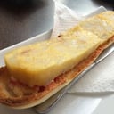 Foto de MEDIA TOSTADA CON TORTILLA DE PATATAS Y TOMATE