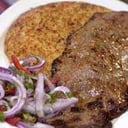 Foto de Bife con tacu tacu 