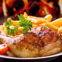 Foto de Cuarto de pollo a la brasa + 2 guarniciones