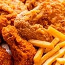 Foto de Pollo entero broaster + 2 guarniciones .