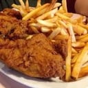 Foto de Medio pollo broster + 2 guarniciones 