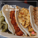 Foto de Tacos de guisado, elaborados con tortilla de maíz, arroz y frijolitos. 