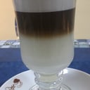 Foto de Capuccino espuma de leche vaso alto.
