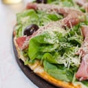 Foto de Pizza Rucula y Crudo