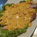 Foto de trucha en salsa de camarones