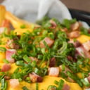 Foto de Panceta, verdeo y cheddar