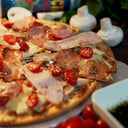 Foto de Pizza de la Casa