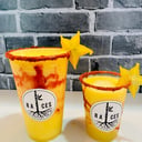 Foto de MangoTango (Fibra de Piña Coco, Mango, y Aloe Vera sabor mango, escarchado con chamoy y tajín). 