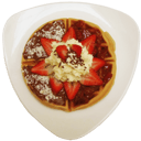 Foto de Waffle de fresas con arequipe y crema chantilly