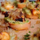 Foto de Tapas de pulpo con tuétano a la Rockefeller