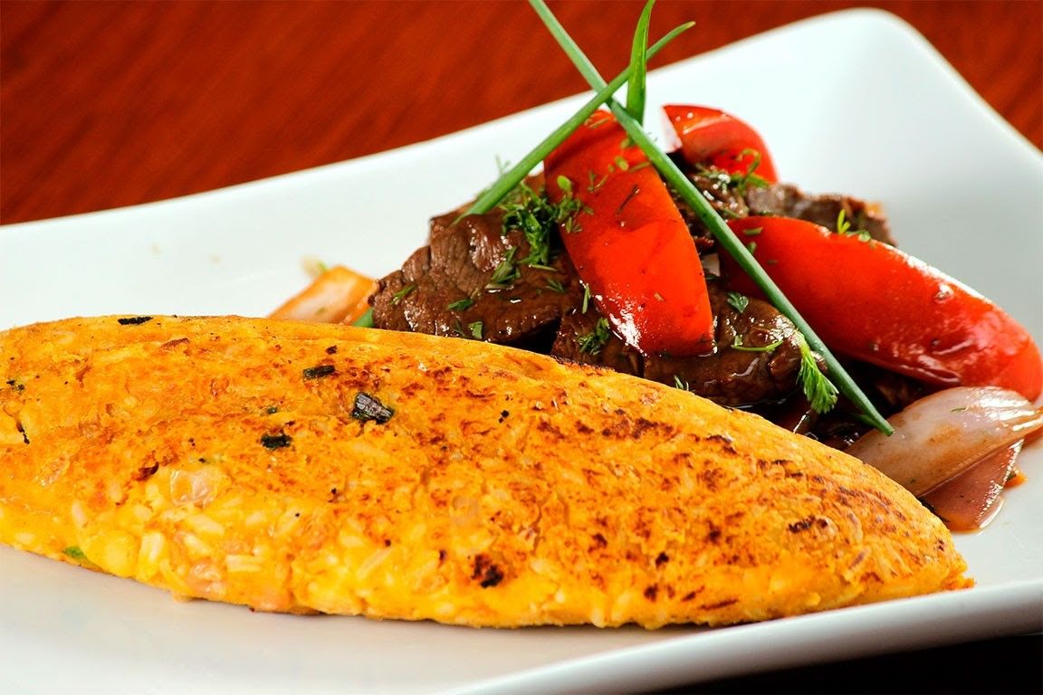 Foto de TACU-TACU CON LOMO SALTADO