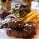 Foto de Bondiola agridulce con fritas