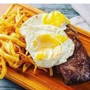 Foto de Bife de chorizo a caballo