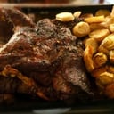 Foto de TERNERA AL HORNO CON PAPAS Y BONIATOS