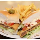 Foto de MILANESA AL PAN CON JAMON Y MUZZA