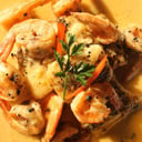 Foto de Corvina a la pimienta y langostinos