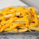 Foto de Papas fritas con cheddar
