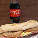 Foto de Sandwich de milanesa + bebida / Breaded meat sandwich with ham and cheese + drink