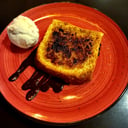 Foto de TORRIJA DE PAN BRIOCHE CARAMELIDA CON HELADO DE LECHE MERENGADA 