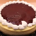 Foto de Rebanada de Pastel de queso con zarzamora
