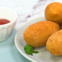 Foto de Bombas de Papa x6 C/baño de cheddar