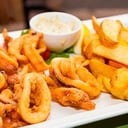 Foto de Rabas con papas fritas + Aderezos