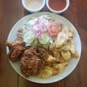 Foto de Pollo con tajadas